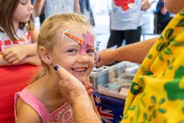Harper-shows-off-her-new-unicorn-face-painting.jpg