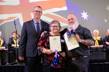 Linda-and-Robert-OHara-receiving-citizenship-certificates-with-Mayor-Jason-Wendt.jpg