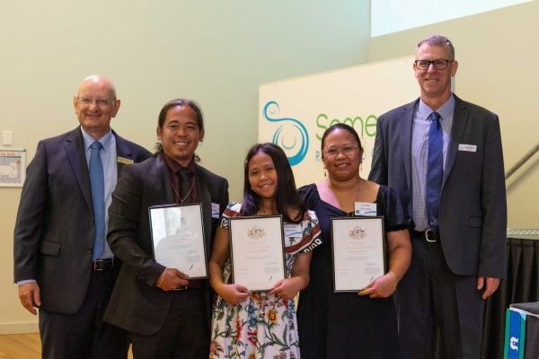 Leonard, Leonnie and Glezel Ladroma received their citizenship certificates with Federal Member for Blair Shayne Neumann and Somerset Regional Council Mayor Jason Wendt